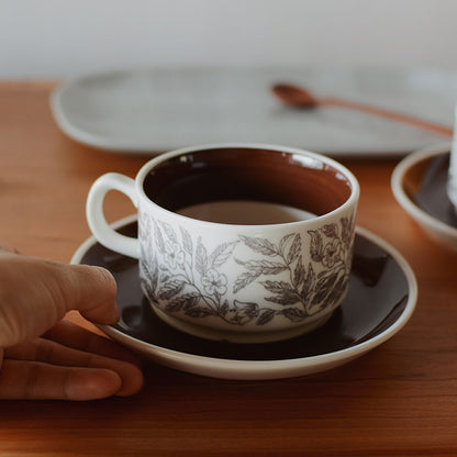 Beige ceramic coffee cup